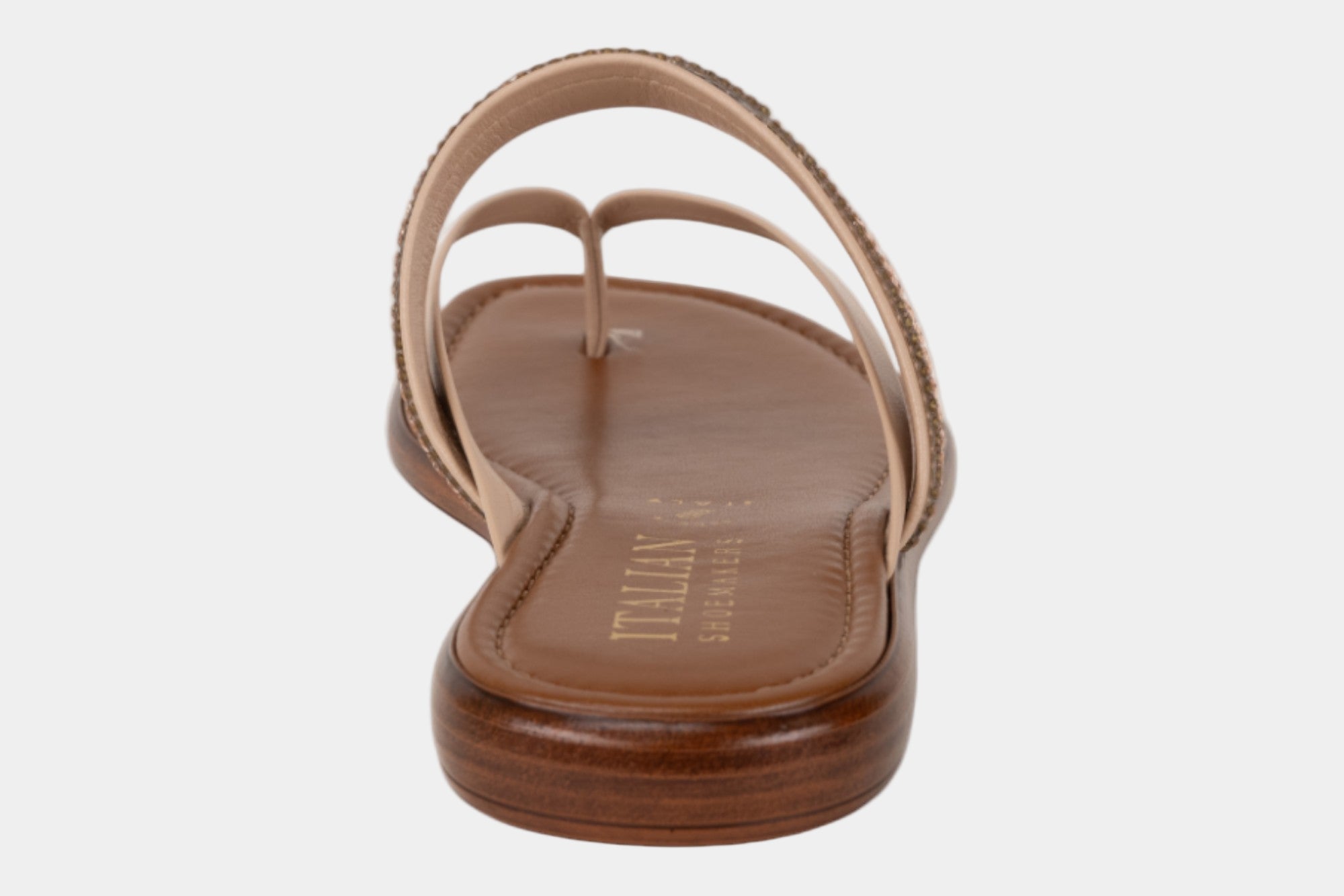 Brown sandal with visible brand name on a white background